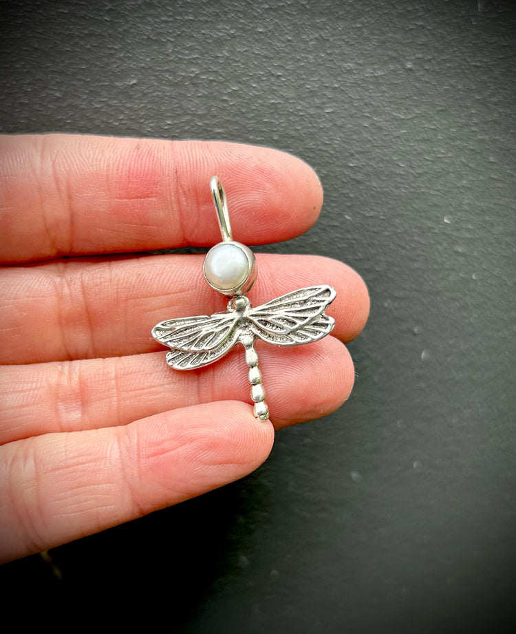 The Dragonfly & her pearl